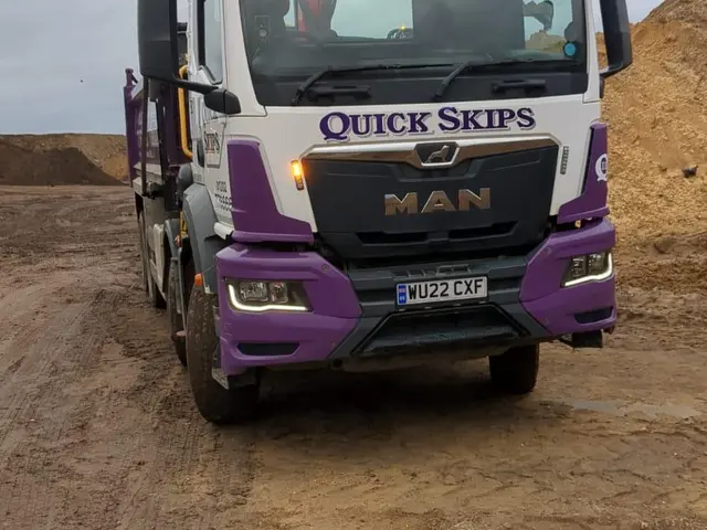 Quick Skips grab lorry on site near Christchurch