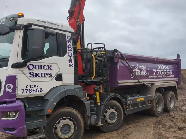 Quick Skips grab hire lorry cab and grab arm